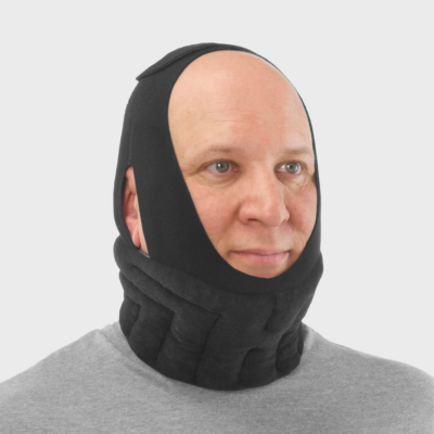 male with black foam, padded compression garment on head, neck, and to jaw