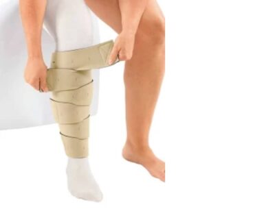 mediven circaid reduction kit, beige lower leg, someone tightening it on the lower leg