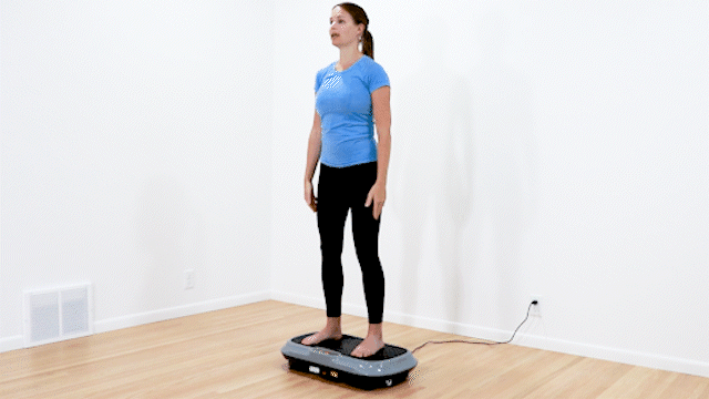 Third vibration plate for lymphatic drainage exercise. Physical therapist doing squats.