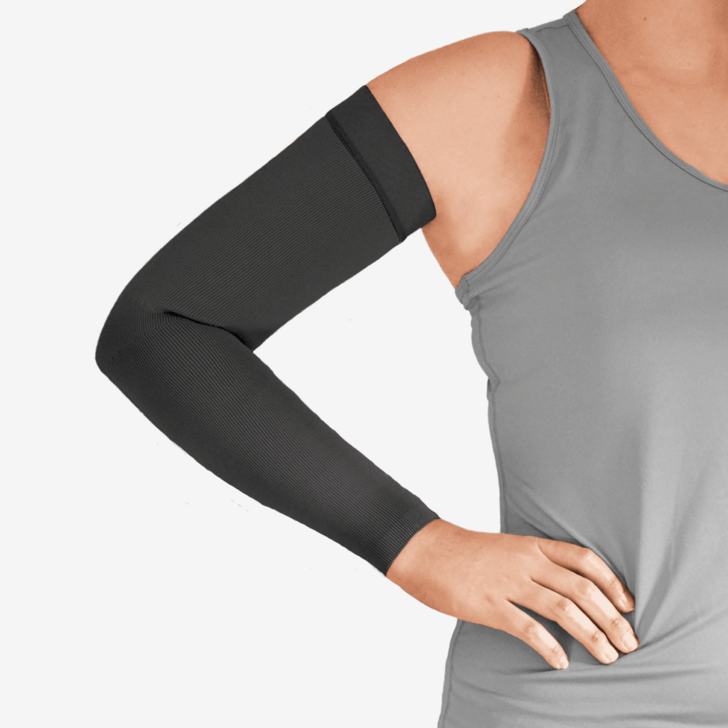 L&R ExoStrong™ Arm Sleeve in black on woman with gray tank top