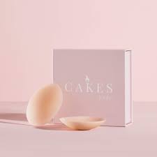 CAKES body grippy circle bra inserts with pink box and pink background