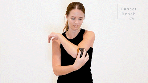 Certified lymphedema therapist demonstrating how to dry brush.