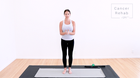 animated clip of physical therapist standing with elbows by her sides and bent. opening arms out tot he side and back