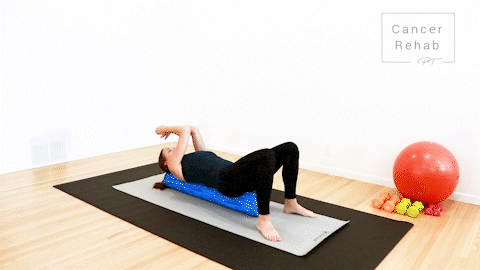 animated clip of physical therapist on a foam roller showing a chest opener stretch, letting arms open up to the sides