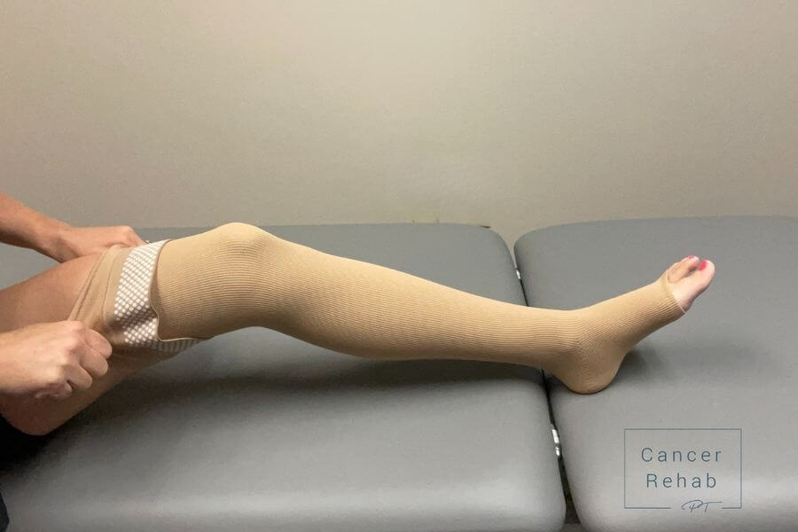 thigh high sock pulling at the mid thigh