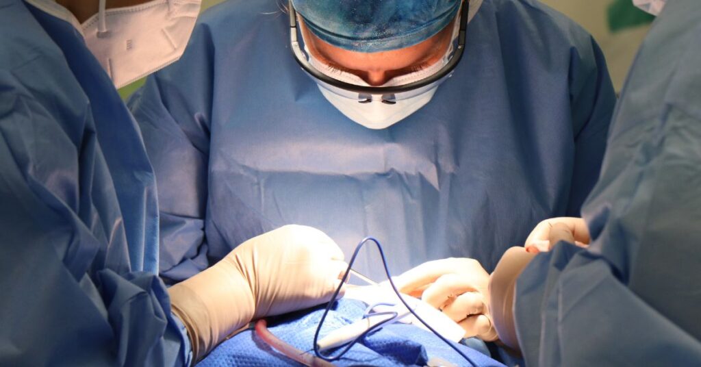 Lymphedema surgery. Surgeon performing the surgery.