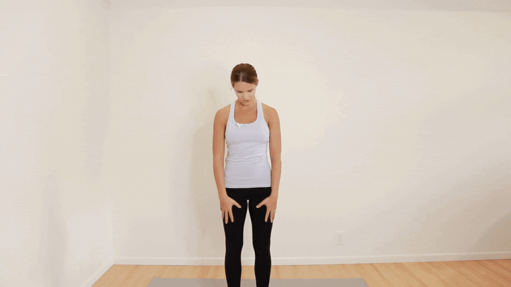 physical therapist showing neck rolls exercise