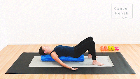 animated clip of physical therapist lying on a long foam roller bring arms out to sides for a chest stretch