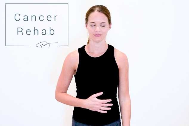 A certified lymphedema therapist demonstrating deep belly breathing.