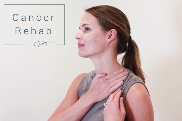 A woman using her hands to stimulate lymph nodes near her collarbone.