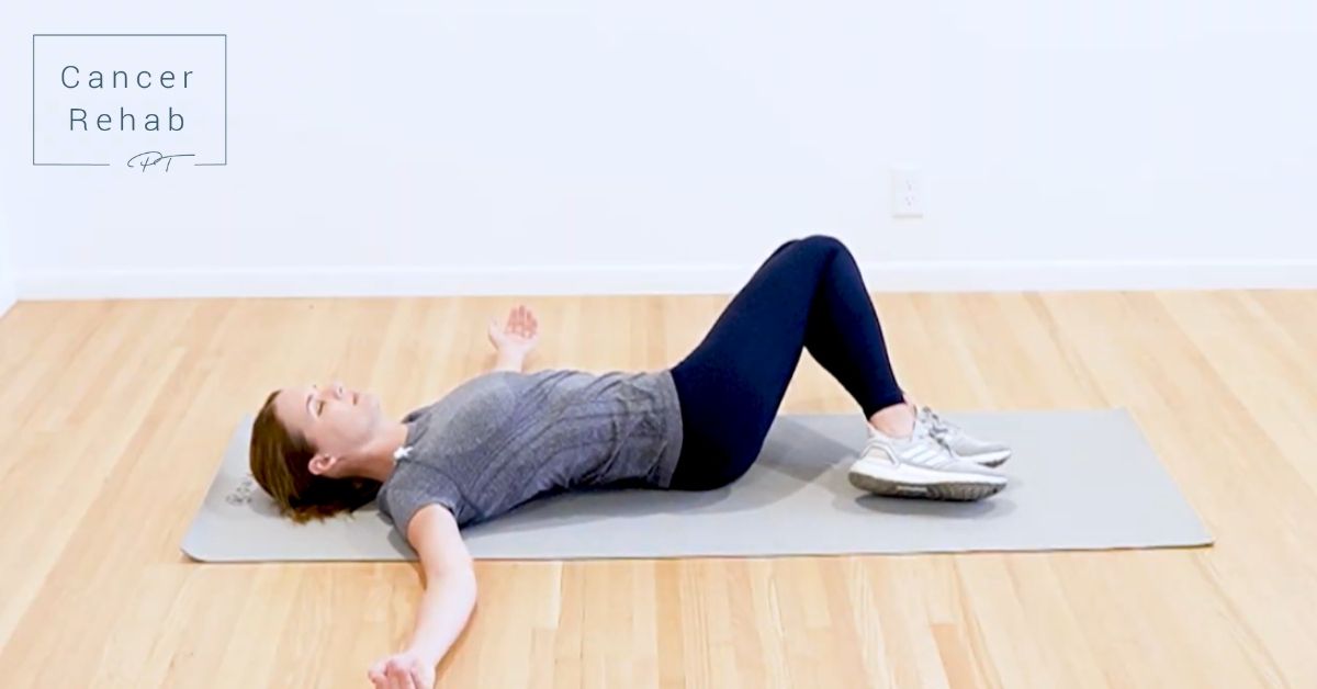 A woman lying on the ground with knees bent and arms out to the side.