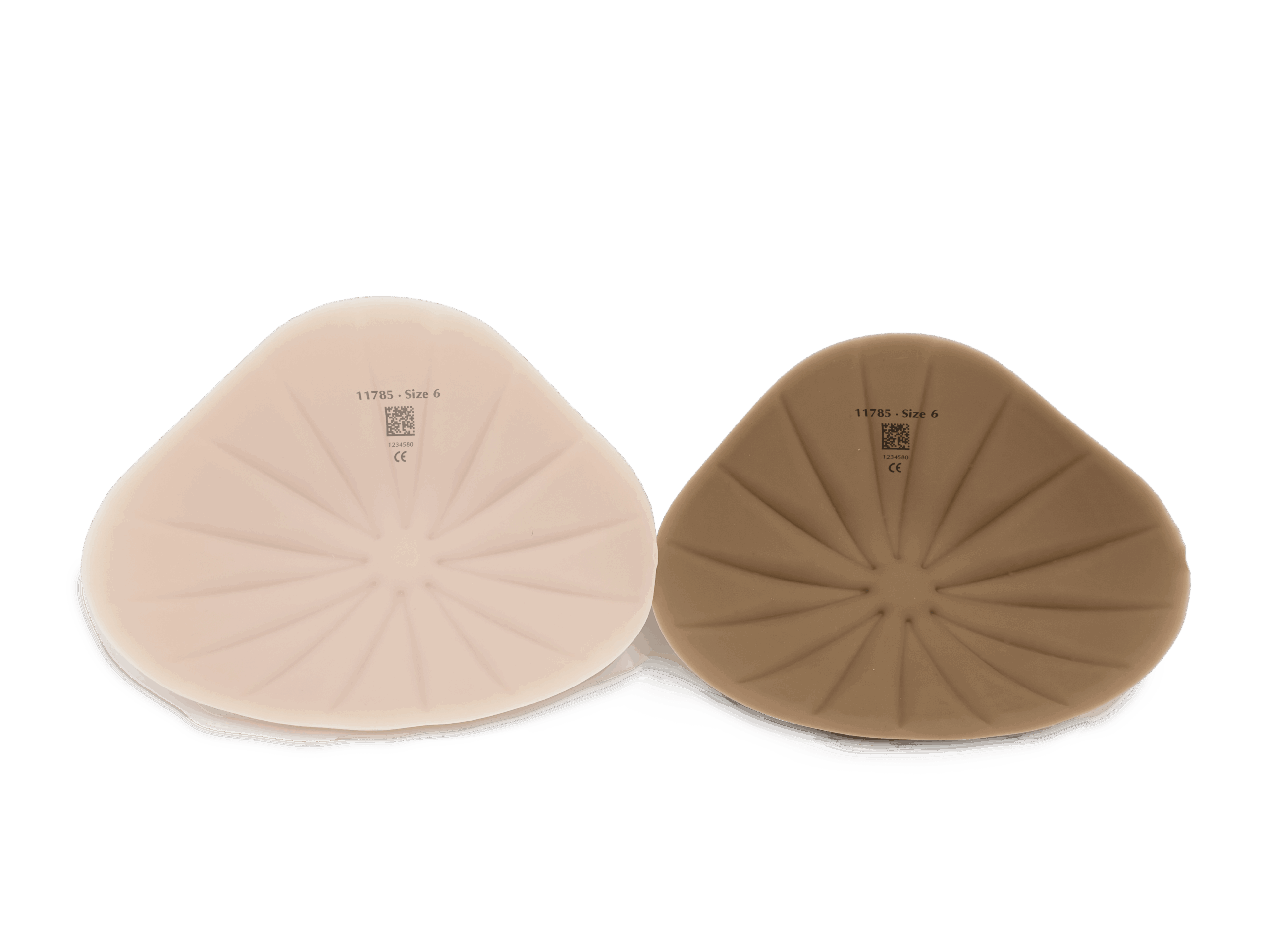 honey and mocha colored breast form shapers laying side by side