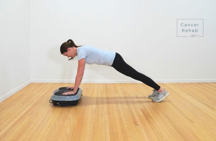What does a vibration plate do? One of the things it can do - showing exercise with a woman using her hands on the vibration plate.